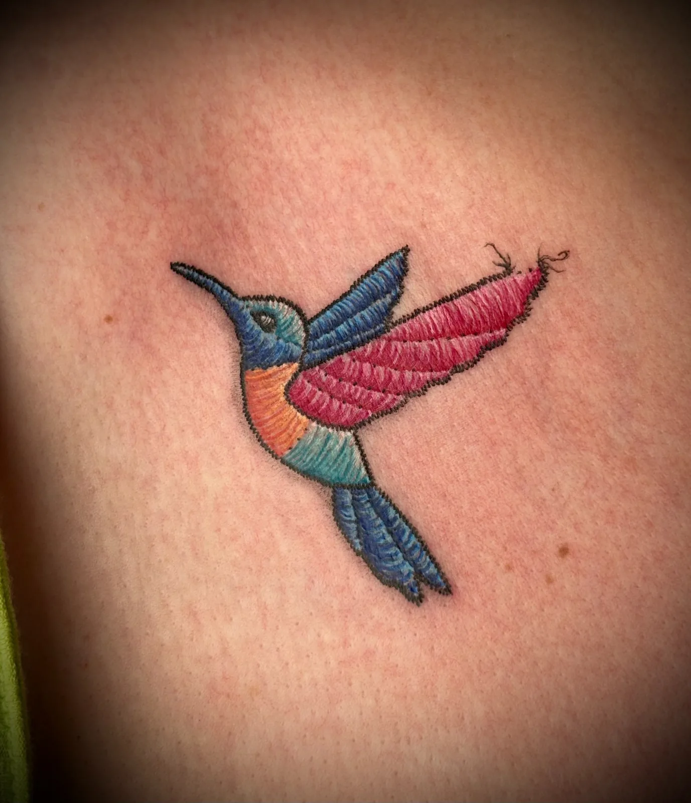 Embroidered hummingbird tattoo by L Dude